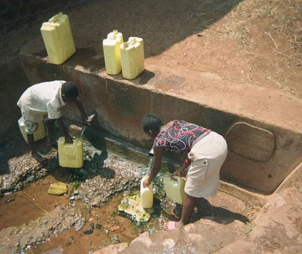 people with water canisters